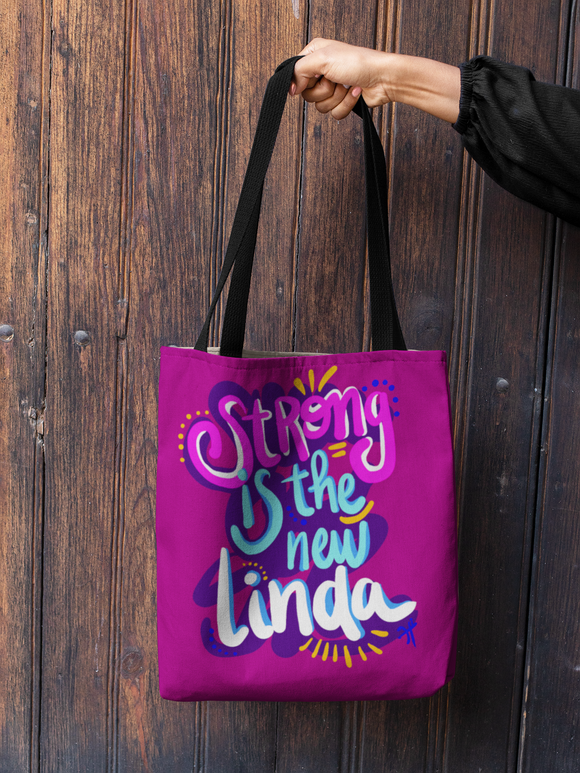 STRONG IS THE NEW LINDA Tote bag
